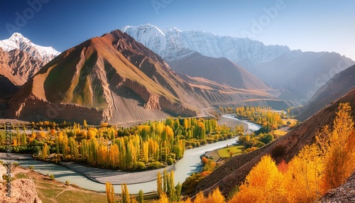 beautiful nature landscape view of winding river flowing along valley in hindu kush mountain range autumn season in gupis ghizer gilgit baltistan pakistan photo