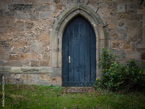 Wallpaper Mural the old door of in stone wall Torontodigital.ca