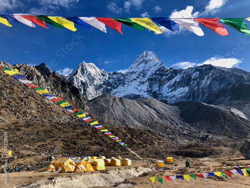 Prayer flags at the Ama Dablam base camp in the Himalayas of Nepal photo