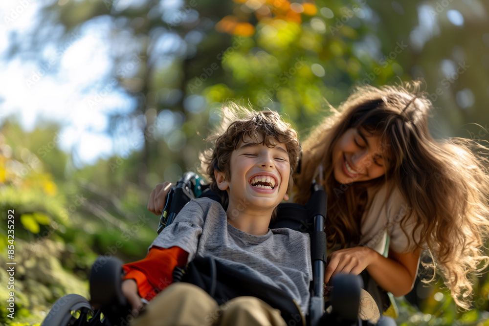 A mentally handicapped boy in a wheelchair smiles and laughs with his mother. A mentally handicapped boy in a wheelchair smiles and laughs with his mother.