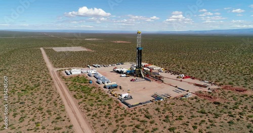 Añelo, Argentina, October 30, 2024: Aerial view of unconventional oil well drilling in Añelo, Neuquen.