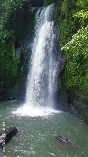 Aerial drone view of Ulu Petanu waterfall in Ubud, Bali, Indonesia photo