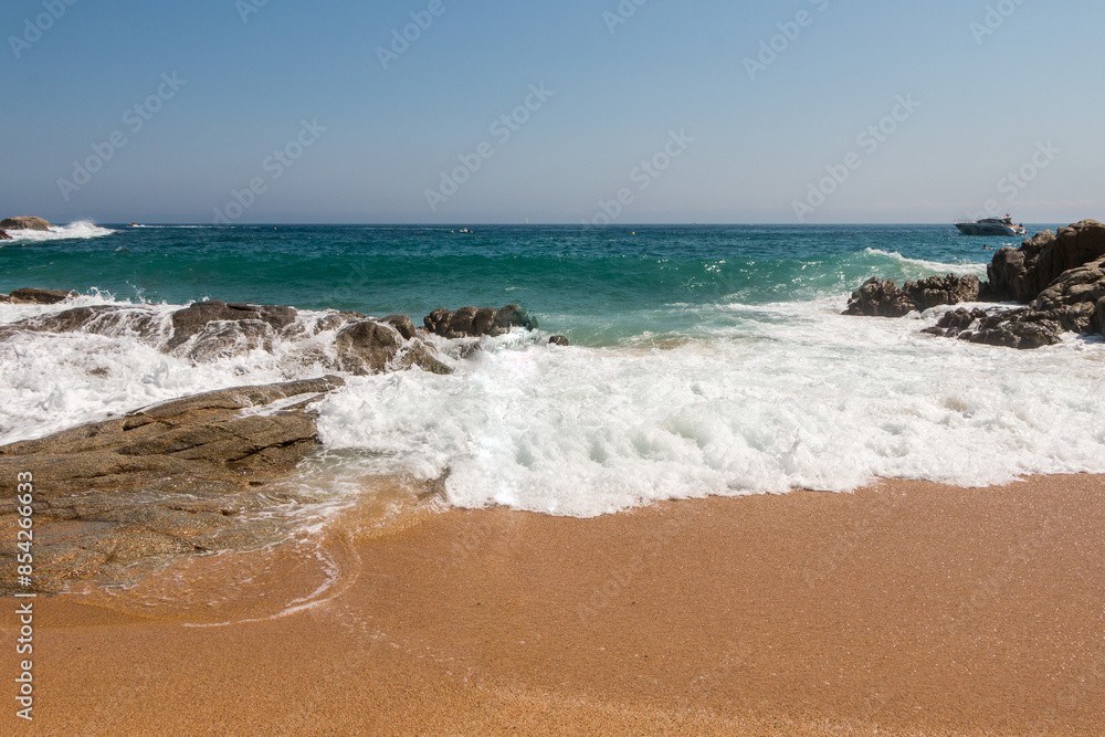 beach in Cala Sa Boadella Bay, Costa Brava, Lloret de Mar, Catalonia, Spain. Beautiful seascape. huge waves beach in Cala Sa Boadella Bay, Costa Brava, Lloret de Mar, Catalonia, Spain. Beautiful seascape. huge waves