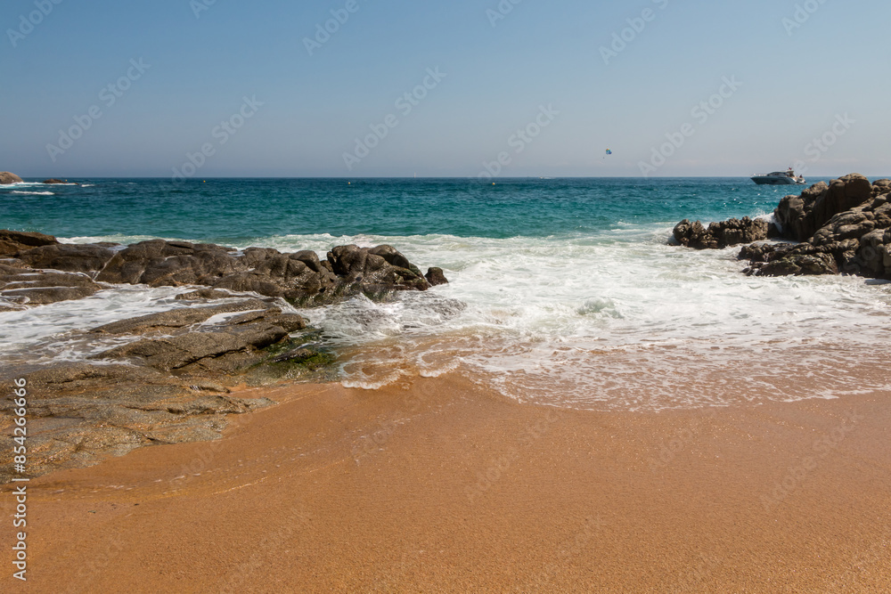 beach in Cala Sa Boadella Bay, Costa Brava, Lloret de Mar, Catalonia, Spain. Beautiful seascape. huge waves beach in Cala Sa Boadella Bay, Costa Brava, Lloret de Mar, Catalonia, Spain. Beautiful seascape. huge waves