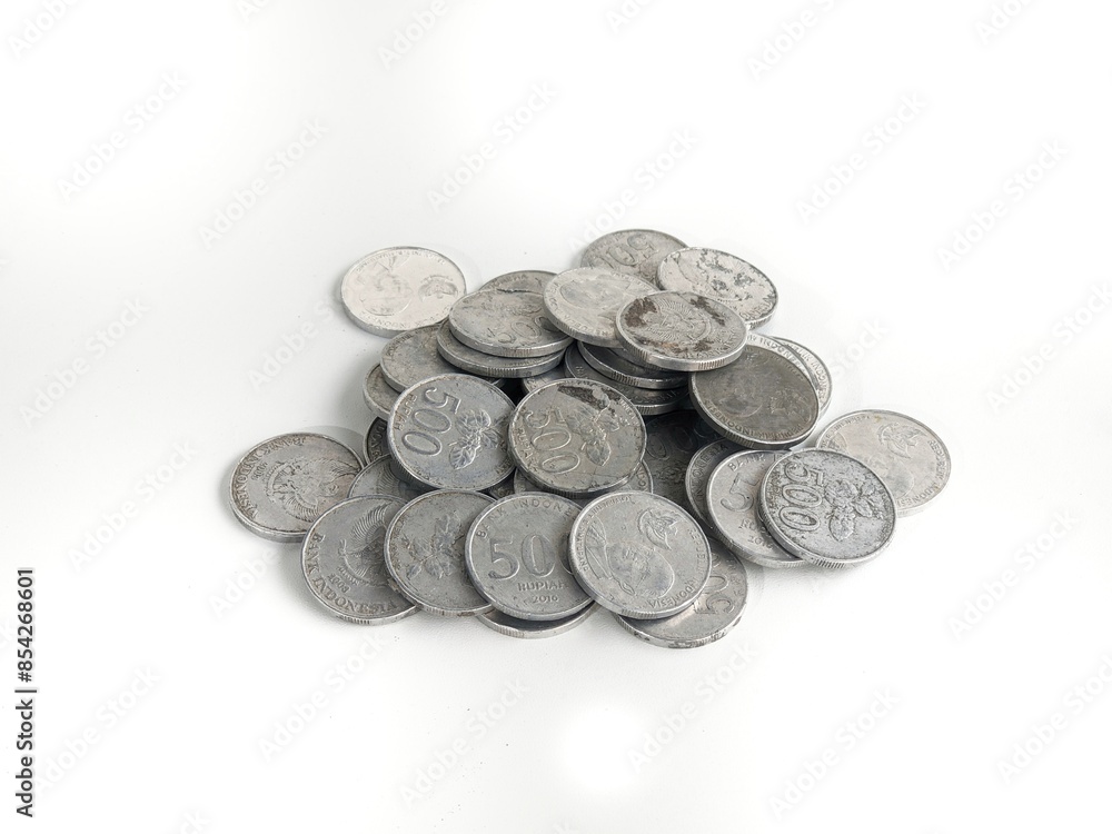 500 rupiah coins. Rupiah coins. Stack of Indonesian Rupiah silver coins. isolated white 500 rupiah coins. Rupiah coins. Stack of Indonesian Rupiah silver coins. isolated white