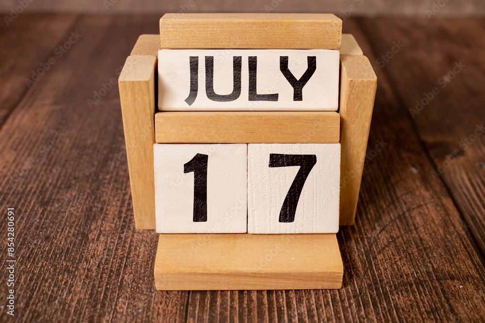 July 17 calendar date text on wooden blocks