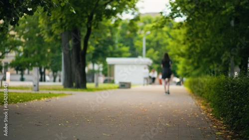 Wallpaper Mural Enjoy a leisurely stroll in a serene city park, perfect for a peaceful escape and relaxation amidst the urban landscape Torontodigital.ca