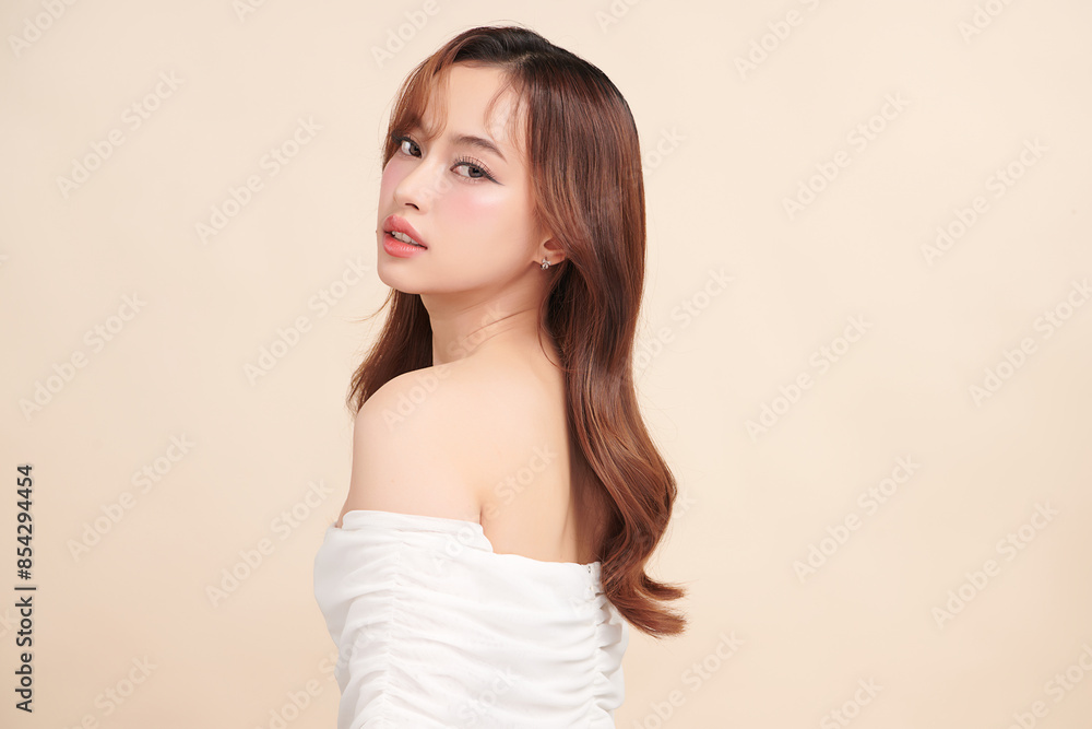 Beautiful young asian woman with clean fresh skin on beige background, Face care, Facial treatment, Cosmetology, beauty and spa, Asian women portrait. Beautiful young asian woman with clean fresh skin on beige background, Face care, Facial treatment, Cosmetology, beauty and spa, Asian women portrait.