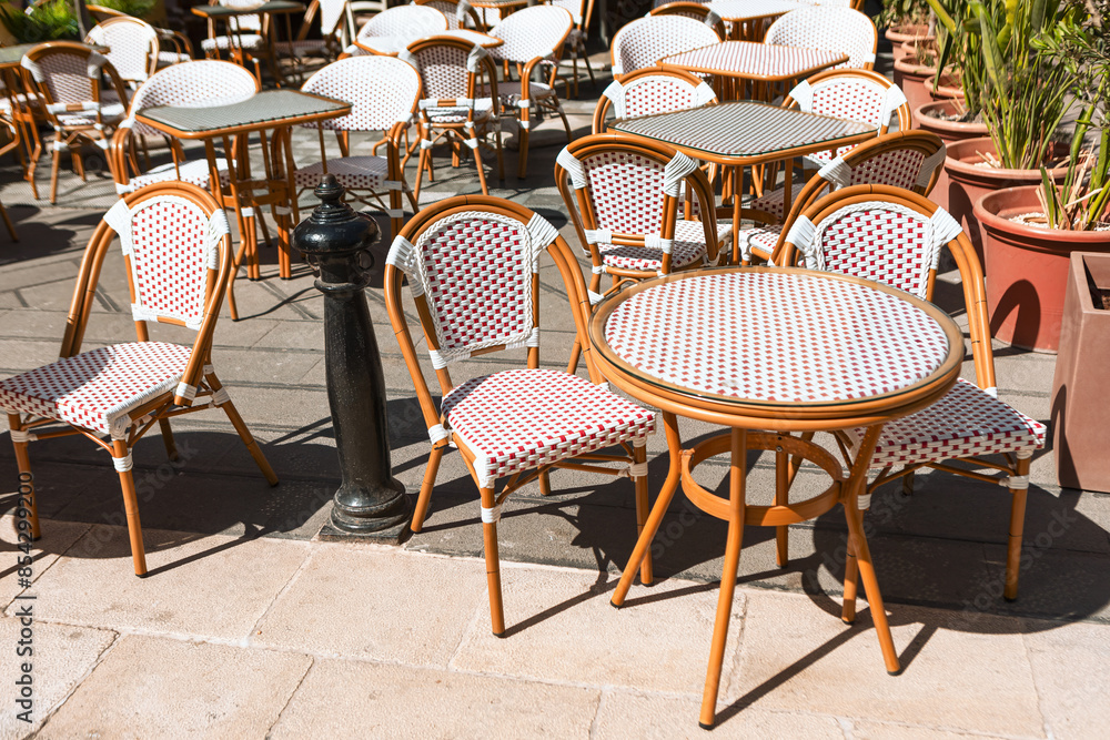 Outdoor cafe terrace with table and chairs. Patio furniture for outdoor use