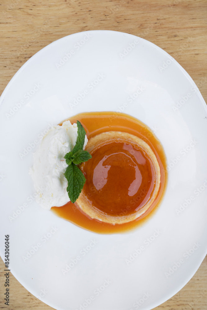 Traditional gourmet dessert. Top view of a flan with cream and caramel. Traditional gourmet dessert. Top view of a flan with cream and caramel.