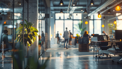 Modern office interior with busy professionals and diverse team working