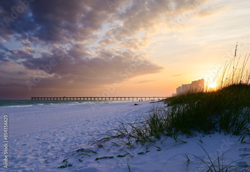 Golden sunset over the Navarre Beach fishig pier in Florida