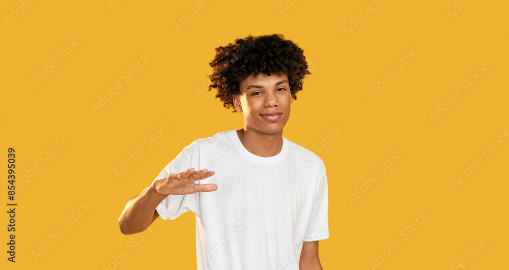 So-so gesture. Dont know. Doubtful skeptic confused disappointed guy not sure hesitating isolated on yellow empty space background. So-so gesture. Dont know. Doubtful skeptic confused disappointed guy not sure hesitating isolated on yellow empty space background.