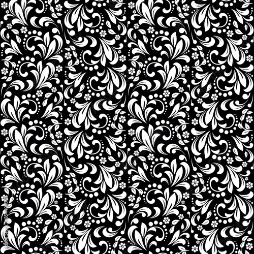 Wallpaper in the style of Baroque. Seamless vector background. White and black floral ornament. Graphic pattern for fabric, wallpaper, packaging. Ornate Damask flower ornament.