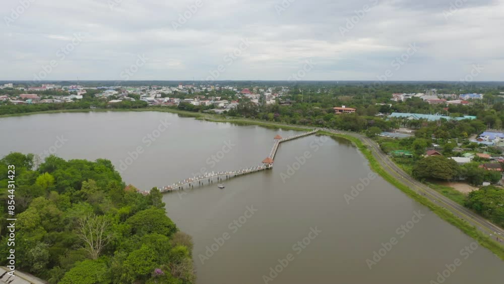 Aerial view of Sisaket tower, tourist attraction landmark. Urban housing development from above. Top view. Real estate in city, Thailand. Property real estate. Aerial view of Sisaket tower, tourist attraction landmark. Urban housing development from above. Top view. Real estate in city, Thailand. Property real estate.