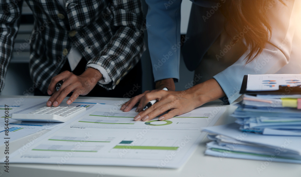 Team of business people working together in the meeting room office, teamwork background charts and graphs banner, double exposure successful teamwork,business planning concept. Team of business people working together in the meeting room office, teamwork background charts and graphs banner, double exposure successful teamwork,business planning concept.