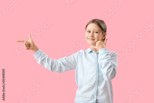 Little girl showing "call m...