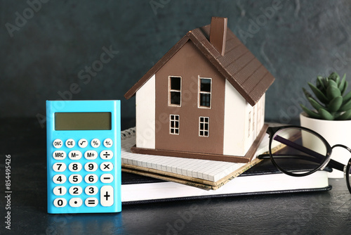 House model, calculator and...