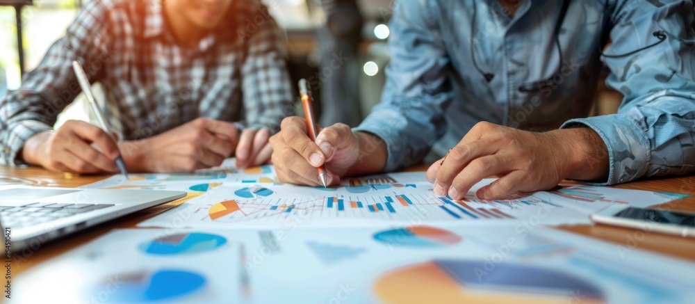 Two Businessmen Analyzing Financial Data Two Businessmen Analyzing Financial Data