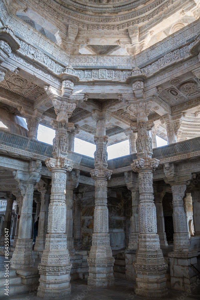 Interior of a temple with columns, dome, showcasing indian architecture, Jain Temple in Ranakpur, Rajasthan, India Interior of a temple with columns, dome, showcasing indian architecture, Jain Temple in Ranakpur, Rajasthan, India