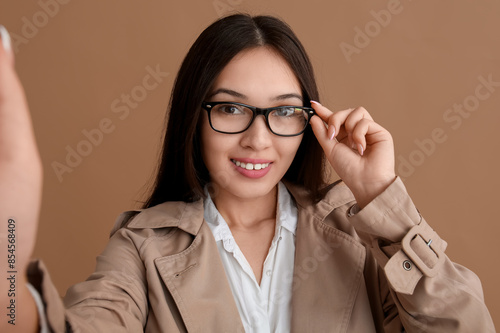 Beautiful young happy Asian...