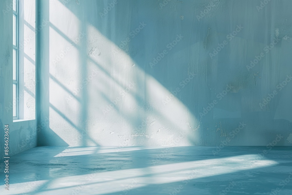 Minimal abstract light blue background for product presentation. Shadow and light from windows on plaster wall. Minimal abstract light blue background for product presentation. Shadow and light from windows on plaster wall.