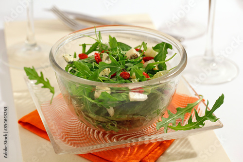 Green salad with goji berries and cheese.