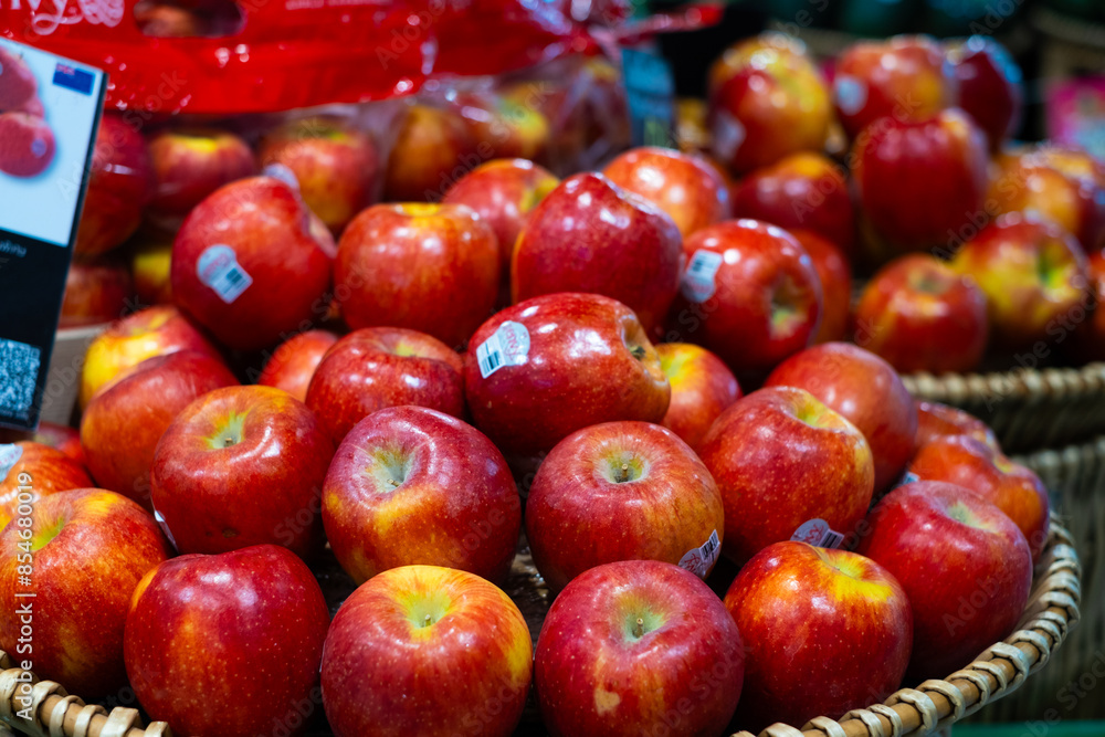 Nonthaburi, Thailand - June 18, 2024: Many red apple in baskets for sale in the supermarket Nonthaburi, Thailand - June 18, 2024: Many red apple in baskets for sale in the supermarket