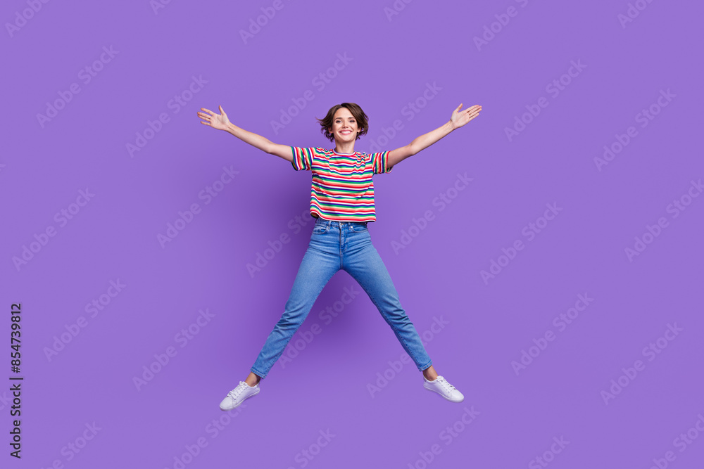 Photo of overjoyed cheerful girl dressed trendy outfit rejoice celebrate seasonal sale isolated on violet color background Photo of overjoyed cheerful girl dressed trendy outfit rejoice celebrate seasonal sale isolated on violet color background