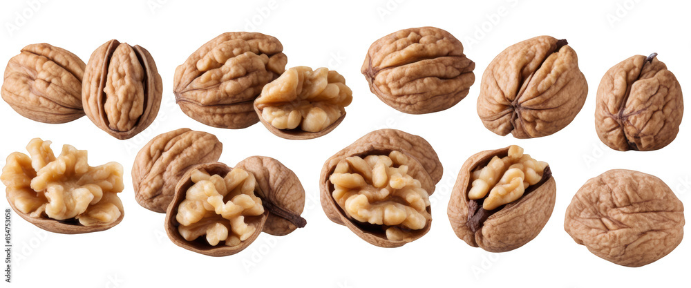 Close-up of whole and cracked walnuts isolate on transparent background, cutout, png Close-up of whole and cracked walnuts isolate on transparent background, cutout, png