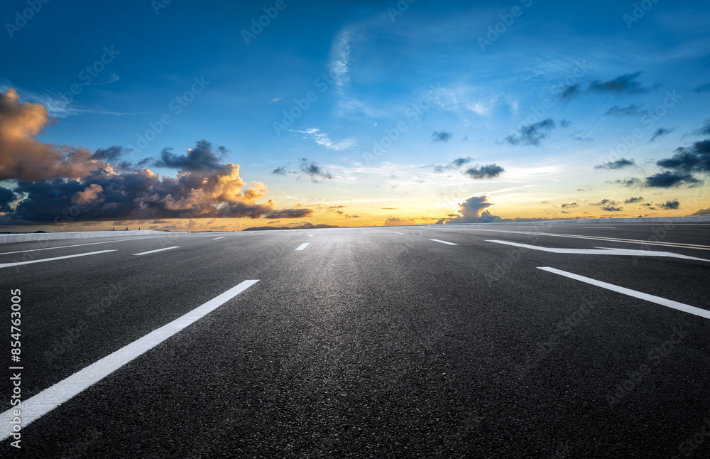 Empty asphalt road and cloudscape on sunny day Empty asphalt road and cloudscape on sunny day