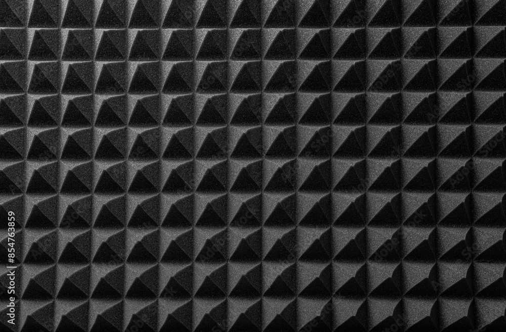 Black acoustic foam as an abstract background.