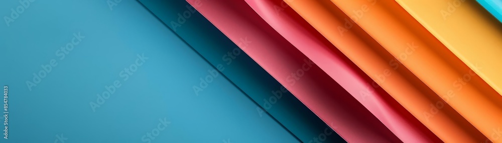 Obraz premium Colorful fabric swatches arranged diagonally on a blue background.