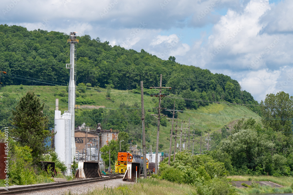 Obraz premium Fuel refinery train tracks industrial background copy space image, natural resources, power energy, environment theme