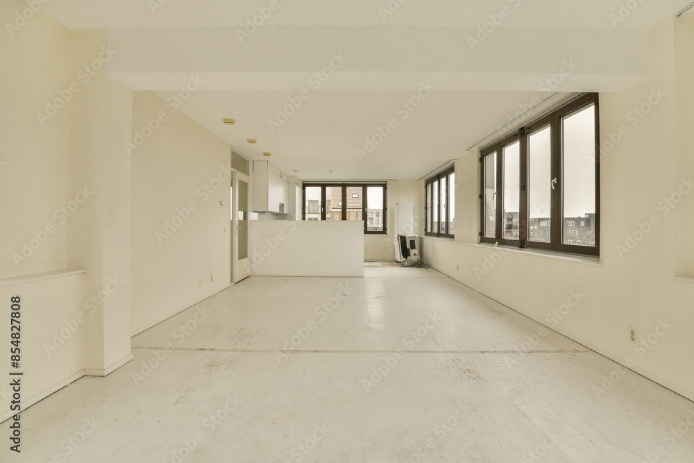 Spacious empty room with large windows at IJburglaan 645