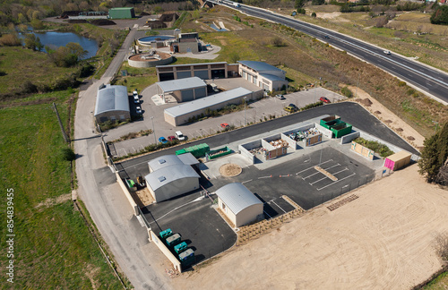 AERIAL VIEW OF A GIGNAC WASTE CENTER IN FRANCE ON THE EDGE OF THE HIGHWAY