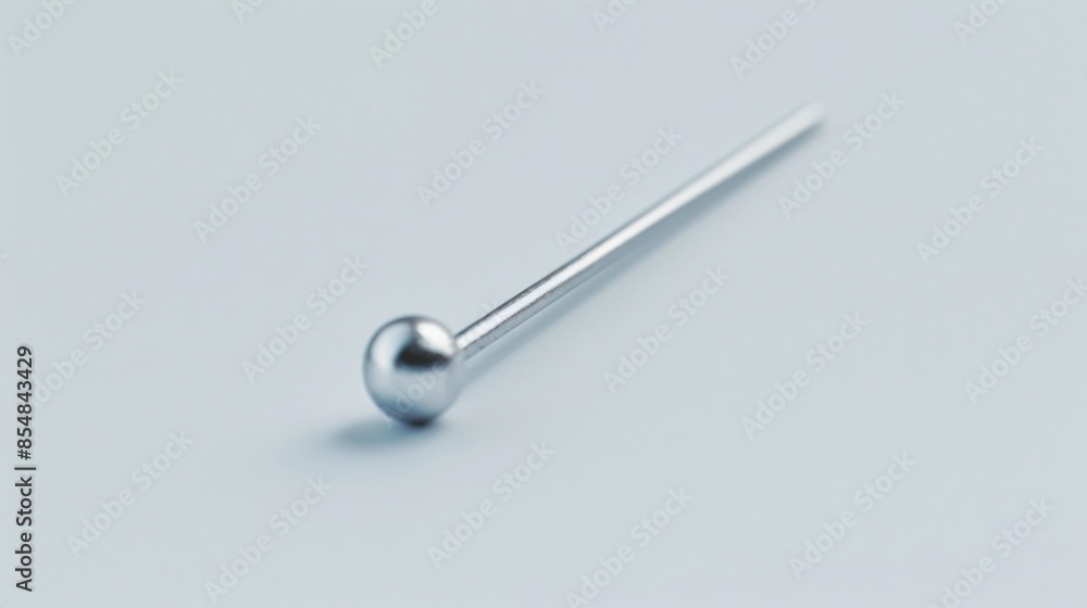 Close-up shot of a metal object on a white background, useful for product or technology images Close-up shot of a metal object on a white background, useful for product or technology images