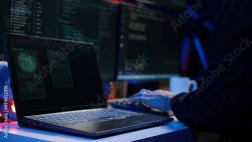 Canvastavla Hooded script kiddie taking laptop out of suitcase, prepared to launch DDoS attack