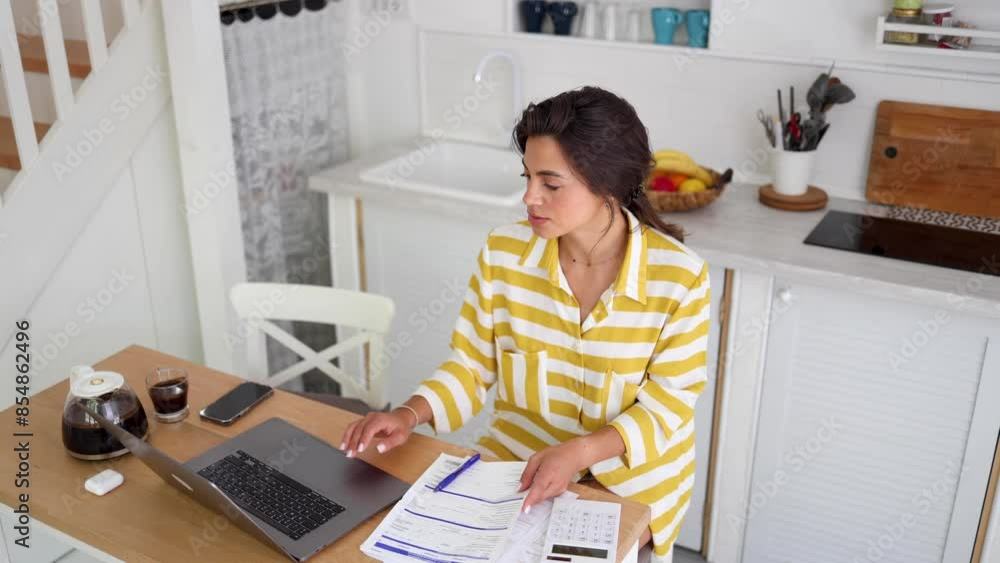 Woman taking care of her financial planning from her house Woman taking care of her financial planning from her house