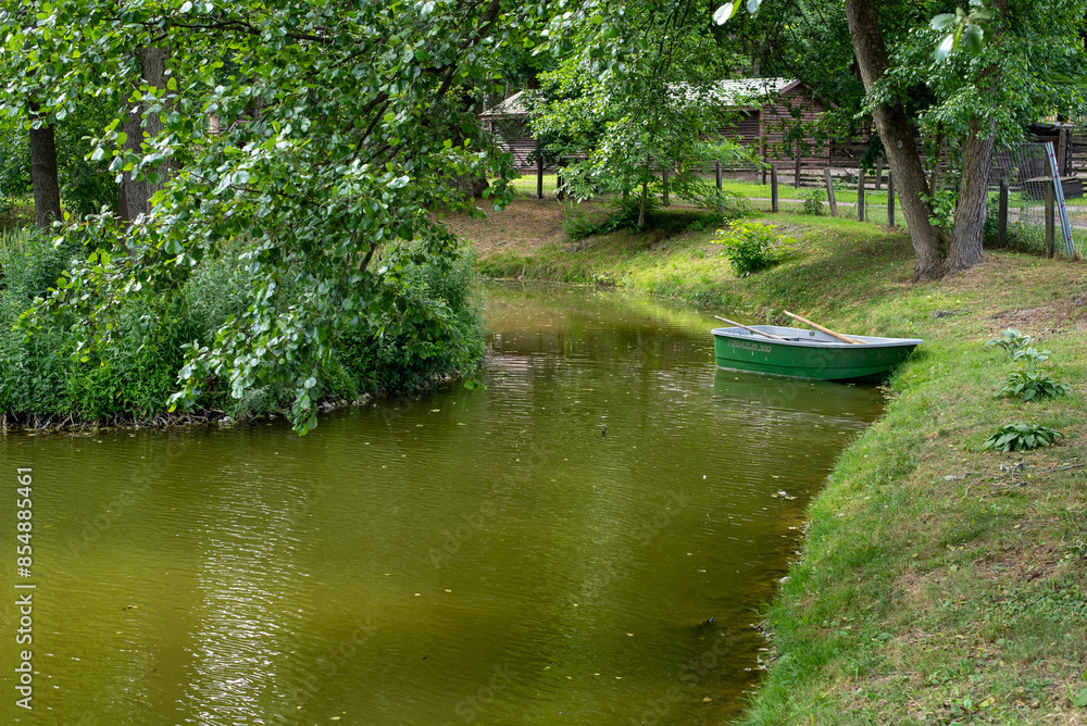 Beautiful Summer Landscape: Boat on a Lake on a Hot Summer Day Beautiful Summer Landscape: Boat on a Lake on a Hot Summer Day