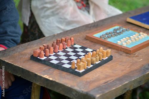 Playing ancient chess shatranj and Persian checkers dama