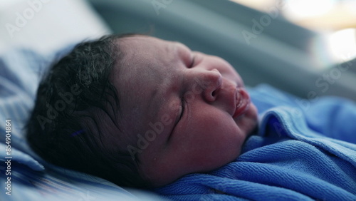 Newborn Baby's First Day - Intimate Close-Up of Infant Exploring New Surroundings © Marco