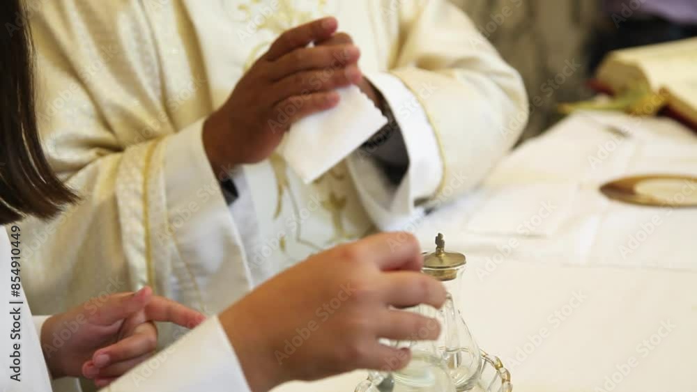 Priest And Assistant Preparing Sacred Vessels For A Catholic ...