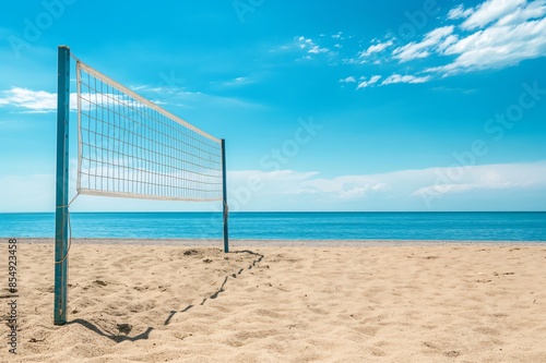 Sunny beach scene with an empty volleyball net set up on the sand, showcasing the tranquility of a summer day