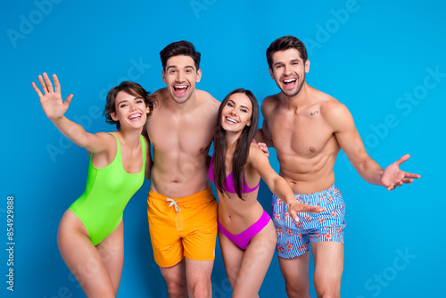 Photo of positive guy have fun on summer paradise welcome invite isolated blue color background © deagreez