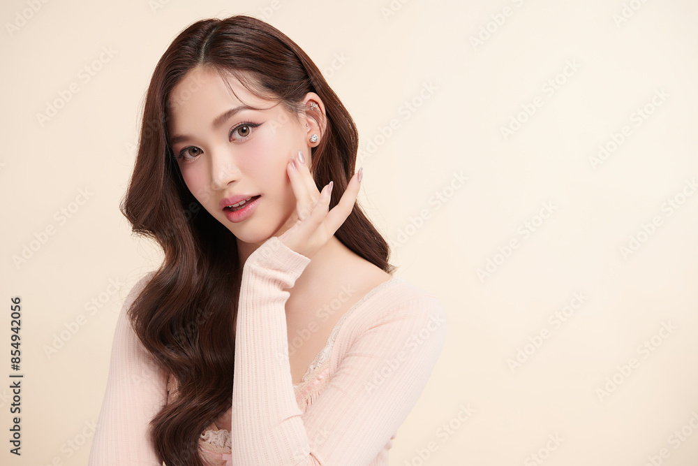 Beautiful young asian woman with clean fresh skin on beige background, Face care, Facial treatment, Cosmetology, beauty and spa, Asian women portrait. Beautiful young asian woman with clean fresh skin on beige background, Face care, Facial treatment, Cosmetology, beauty and spa, Asian women portrait.