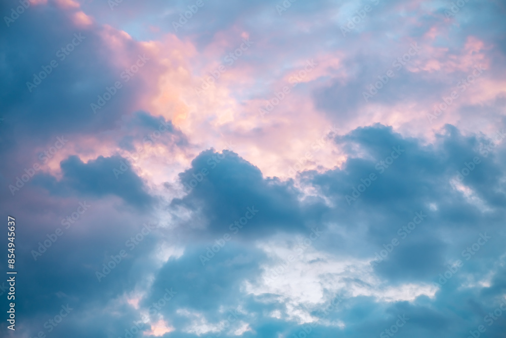 Beautiful clouds in the sky at sunset, pink and blue, natural background, romance, magic Beautiful clouds in the sky at sunset, pink and blue, natural background, romance, magic