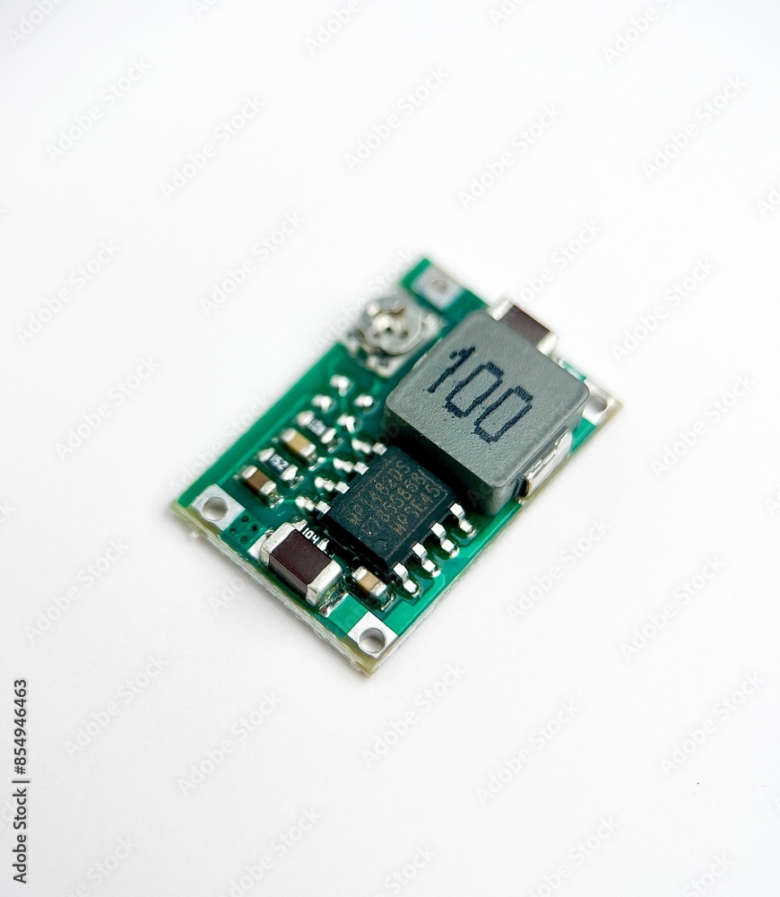 Small step down mini converter circuit electronic part object isolated on white background photography. Small step down mini converter circuit electronic part object isolated on white background photography.