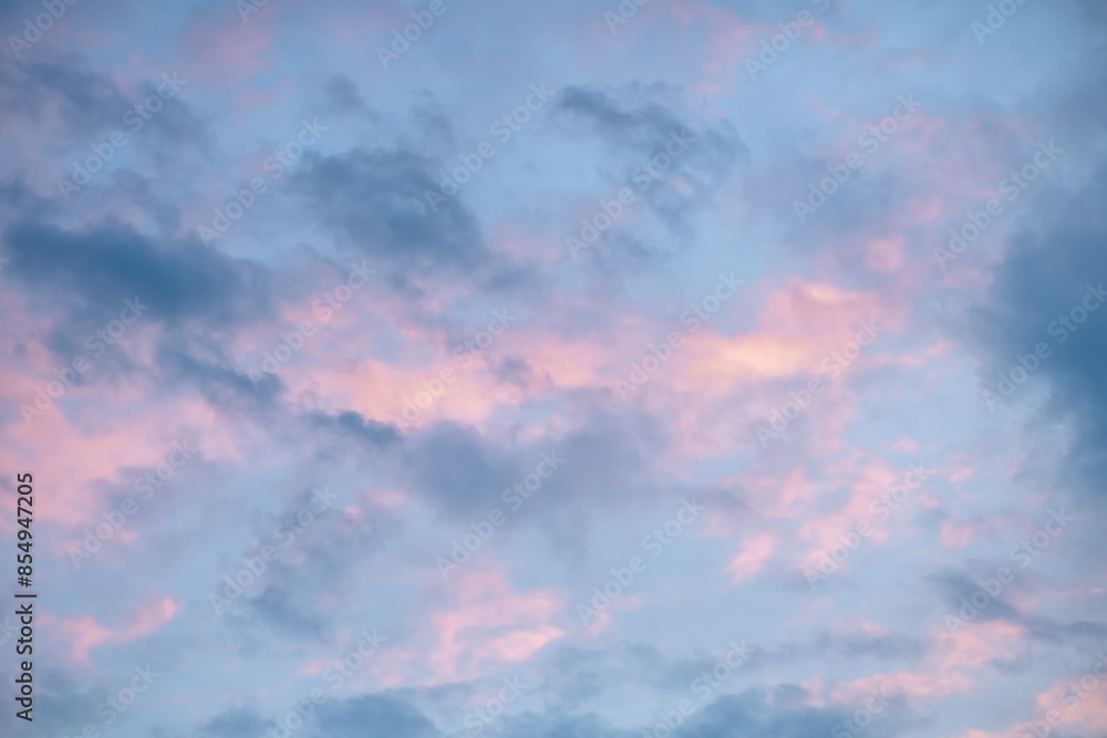 Beautiful clouds in the sky at sunset, pink and blue, natural background, romance, magic Beautiful clouds in the sky at sunset, pink and blue, natural background, romance, magic