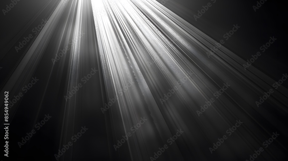 A beam of light shining down from the top left corner, with rays spreading out to form an abstract background on a black and white gradient background. A beam of light shining down from the top left corner, with rays spreading out to form an abstract background on a black and white gradient background.
